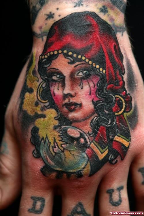 Amazing Colored Gypsy Tattoo On Left Hand
