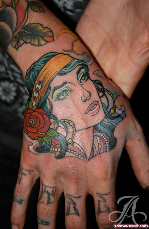 Color Ink Gypsy Head Tattoo On Right Hand