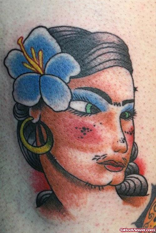 Blue Flower and Gypsy Head Tattoo