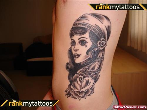 Awesome Grey Ink Gypsy Tattoo On Man Side Rib