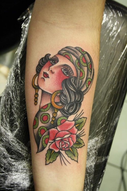Pink Rose And Gypsy Head Tattoo On Arm