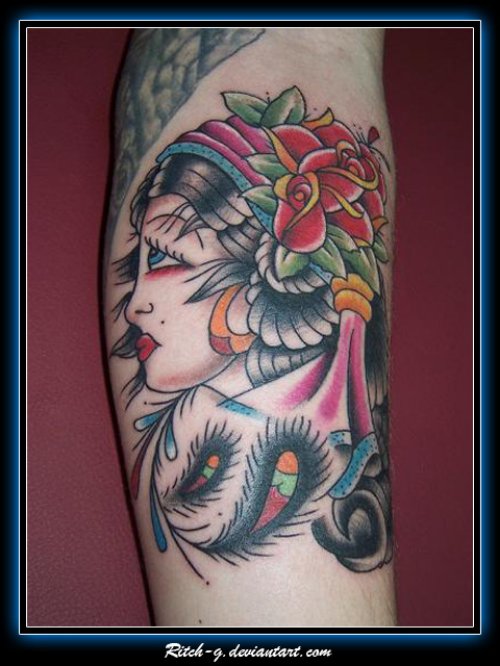 Traditional Flower and Gypsy Tattoo