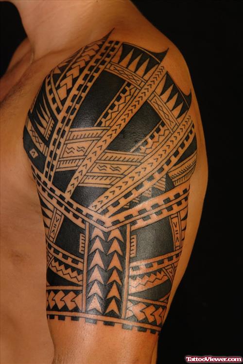 Polynesian Half Sleeve Tattoo On Left Shoulder