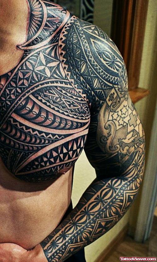 Awesome Black Ink Maori Tribal Tattoo on Chest And Left Sleeve