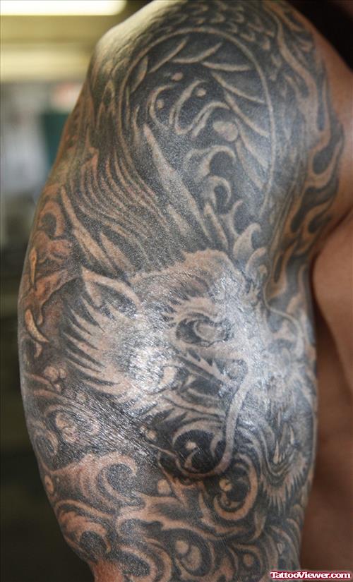 Awesome Grey Ink Dragon Half Sleeve Tattoo For Men