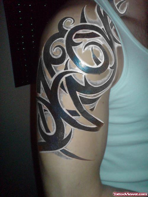 White ink and Black Tribal Half Sleeve Tattoo