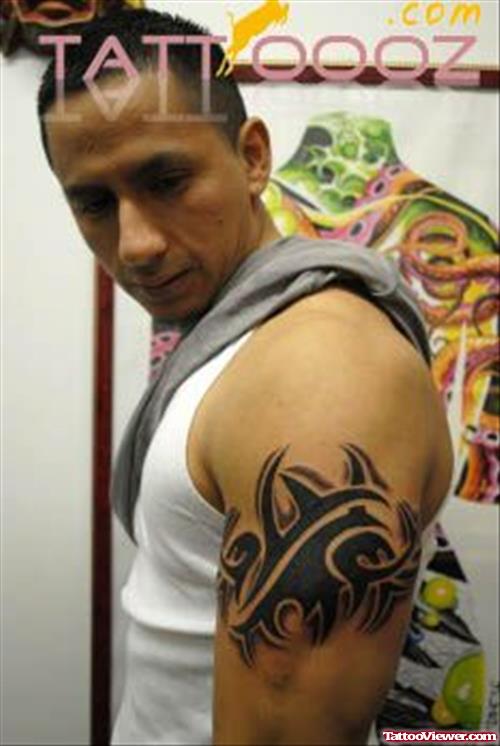 Black Ink Tribal Half Sleeve Tattoo For Men