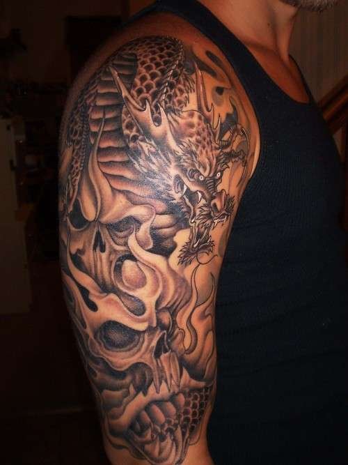 Grey Ink Skull and Dragon Half Sleeve Tattoo