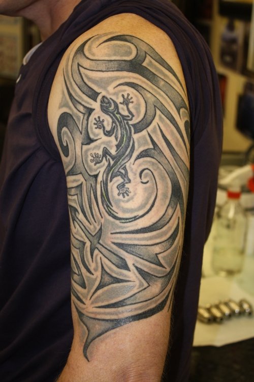 Grey Ink Lizard And Tribal Half Sleeve Tattoo