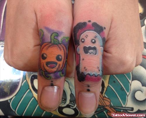 Halloween Tattoos On Both Thumbs