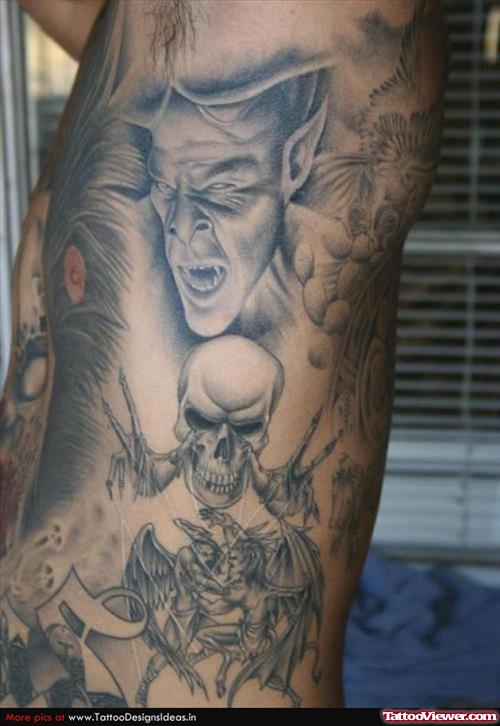 Grey Ink Halloween Tattoo On Man Side Rib