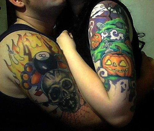 Awesome Colored Halloween Tattoos On Half Sleeve