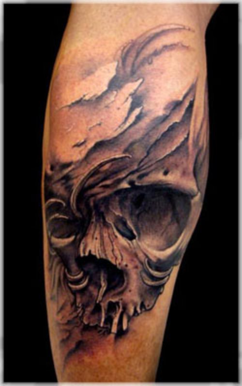 Grey Ink Halloween Skull Tattoo On Leg