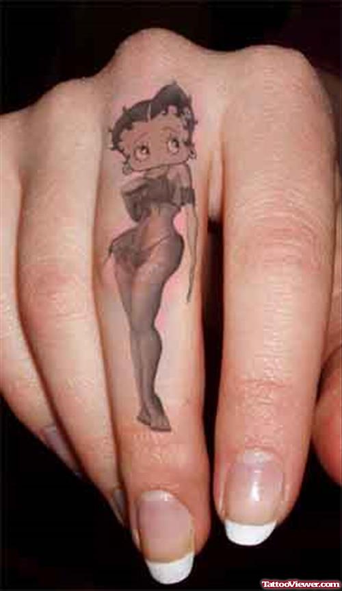 Grey Ink Betty Boop Hand Tattoo For Girls