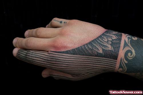Attractive Black Ink Tribal Hand Tattoo For Girls