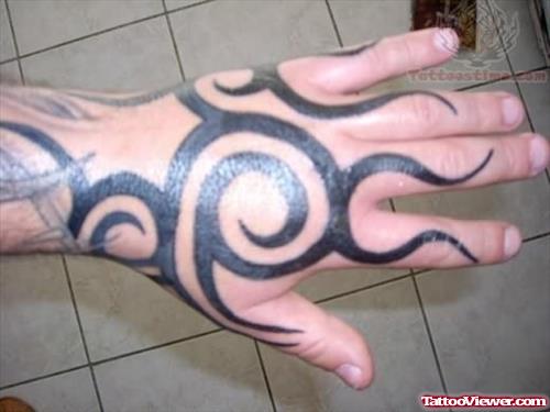 Awesome Black Tribal Tattoo On Left Hand