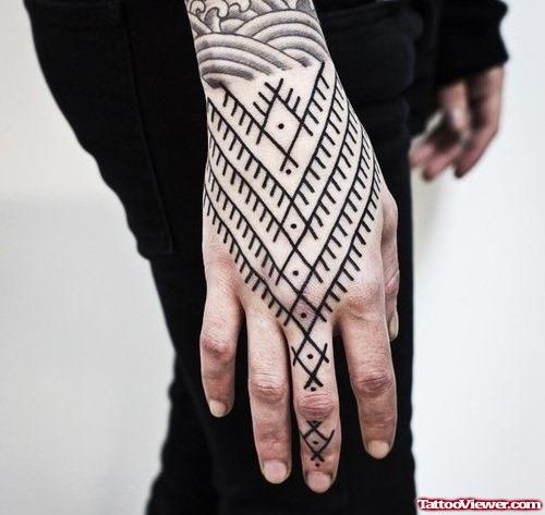 Amazing Black Ink Tattoo On Right Hand