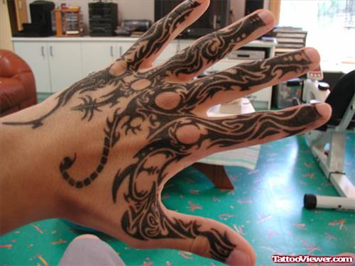 Awful Black Ink Tribal Hand Tattoo