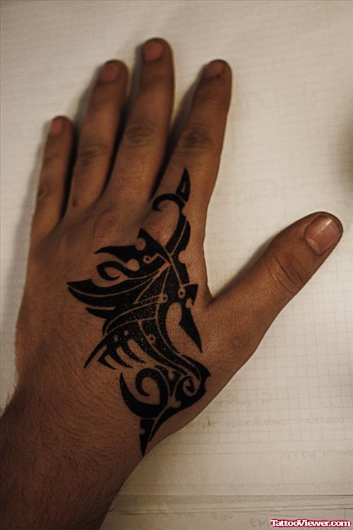 Amazing Black Tribal Left Hand Tattoo