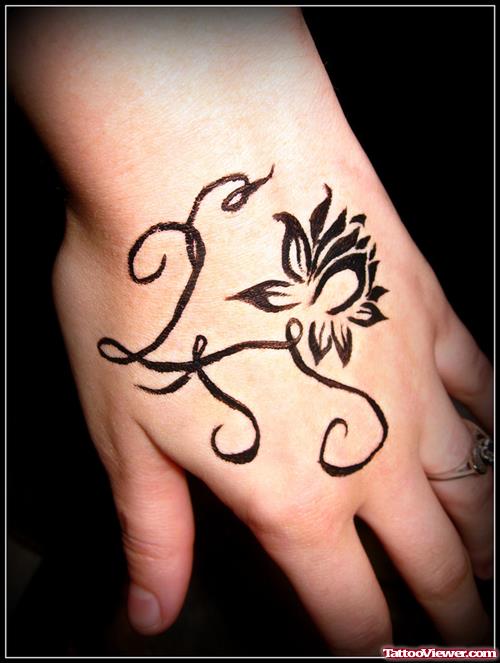 Lotus Tribal Hand Tattoo