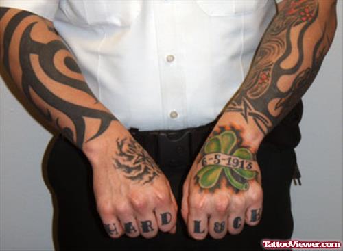 Memorial Banner And Clover Leaf Hand Tattoo