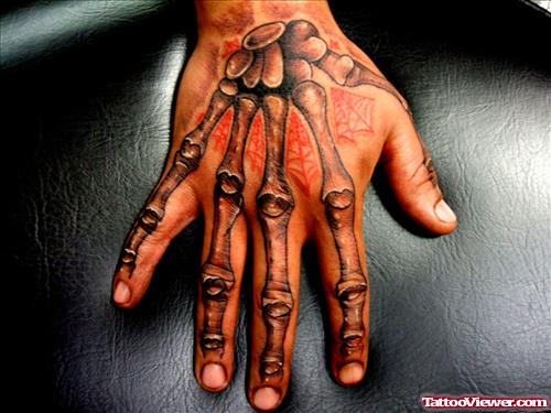 Grey Ink Finger Skeleton Hand Tattoo
