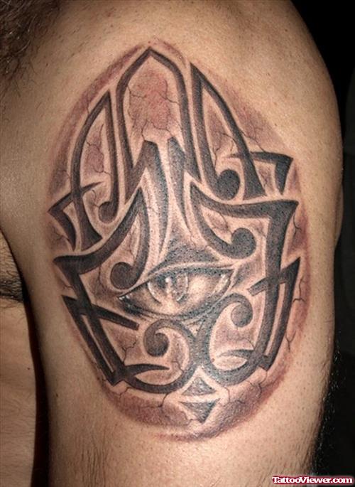 Grey Ink Tribal Tattoo On Man Left Shoulder