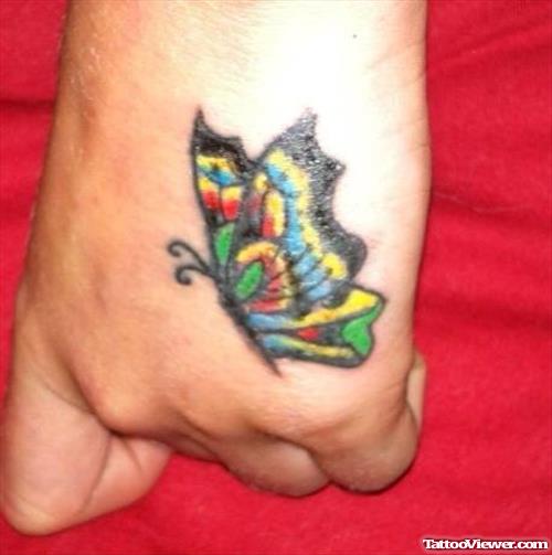 Colored Butterfly Hand Tattoo For Girls