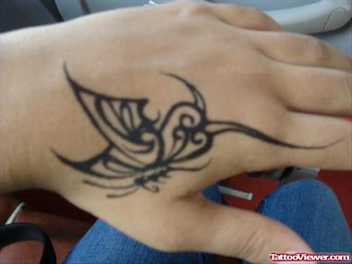 Black Tribal Butterfly Hand Tattoo