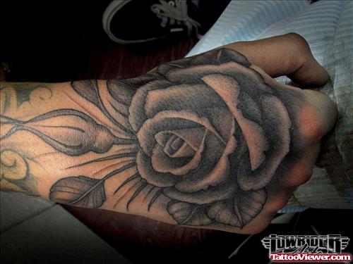 Awesome Grey Ink Flowers Hand Tattoo