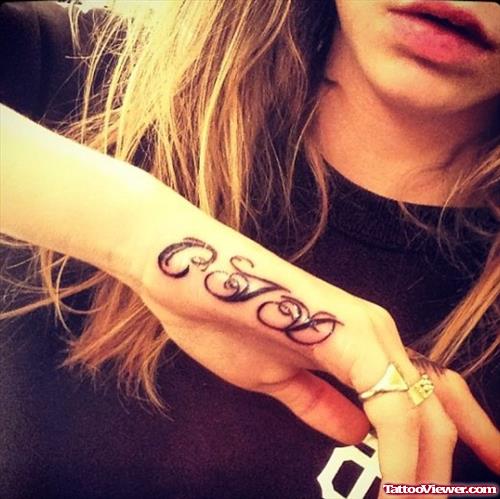 Black Ink Hand Tattoo For Girls