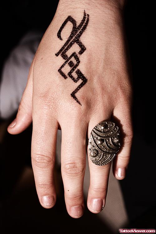 Black Ink Tribal Left Hand Tattoo For Girls