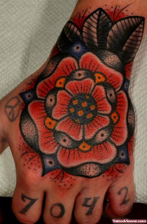 Traditional Flower Hand Tattoo