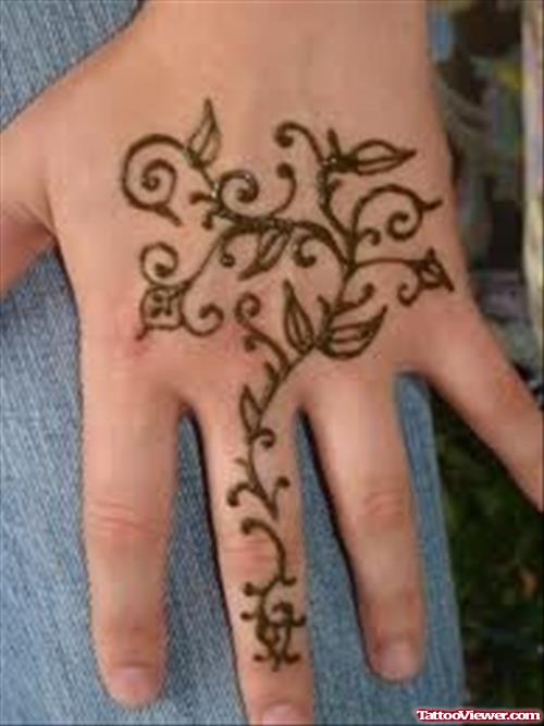 Henna Swirl Tattoo On Girl Left Hand
