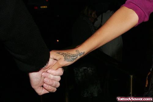 Rihanna Tribal Hand Tattoo