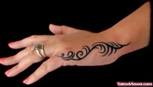 Amazing Tribal Design Hand Tattoo