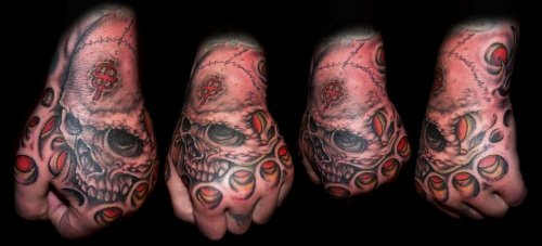 Biomechanical Skull Hand Tattoos Designs