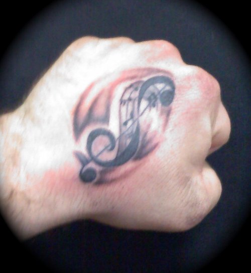 Grey Ink Music Notes Hand Tattoo