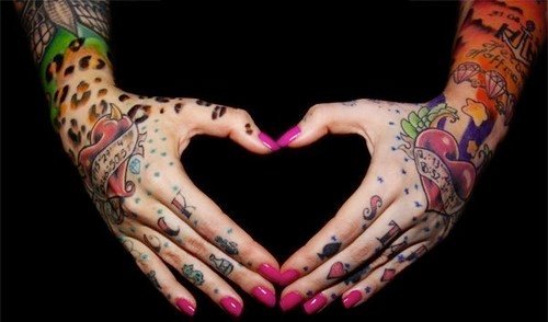 Awesome Colored Hearts Hand Tattoos
