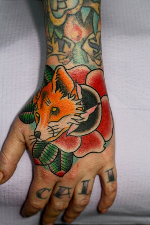 Fox Head And Flower Hand Tattoo