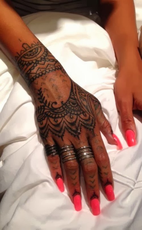 Awesome Black Ink Tattoo On Girl Right Hand