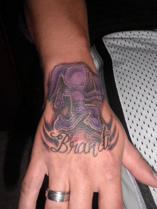 Brandi purple Ink ICP Hand Tattoo