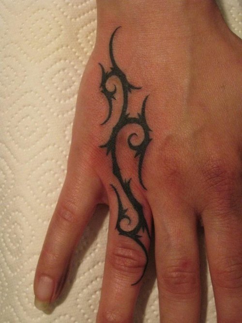 Amazing Black Tribal Tattoo On Right Hand and Finger