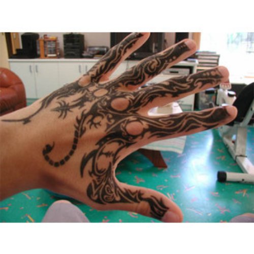 Left Hand Black Tribal Tattoo