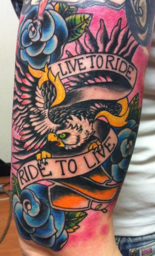 Live To Rise Banner and Harley Tattoo On Sleeve