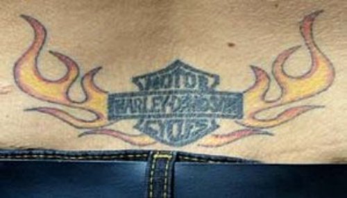 Flaming Harley Tattoo On Man Lowerback