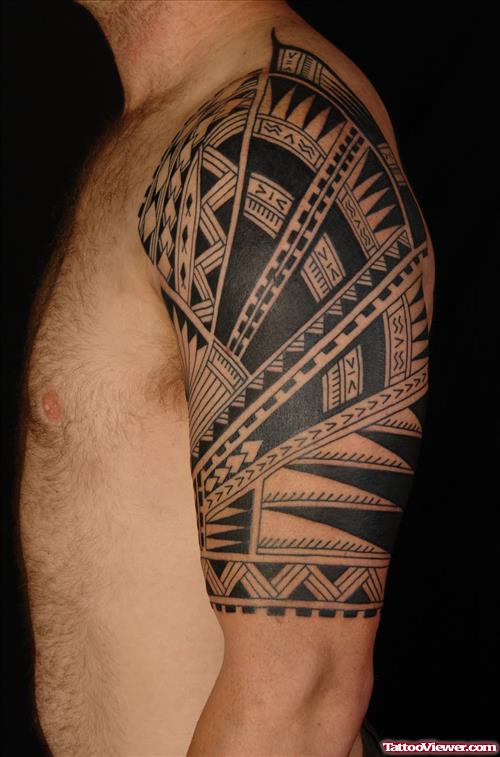 Hawaiian Tattoos On Man Left Half Sleeve