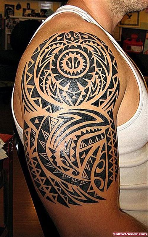 Tribal Hawaiian Tattoo On Man Right Half Sleeve