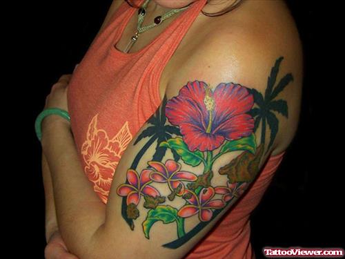 Colored Hawaiian Flowers Tattoos On Left Half Sleeve