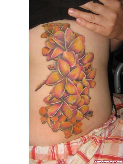 Color Ink Hawaiian Flowers Tattoos On Girl Side Rib